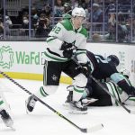 
              Dallas Stars center Vladislav Namestnikov comes up wth the puck behind the net against the Seattle Kraken during the second period of an NHL hockey game Sunday, April 3, 2022, in Seattle. (AP Photo/John Froschauer)
            