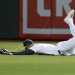 
              Oakland Athletics right fielder Seth Brown dives unsuccessfully for a double hit by Baltimore Orioles Austin Hays during the fifth inning of a baseball game in Oakland, Calif., Monday, April 18, 2022. (AP Photo/Jed Jacobsohn)
            