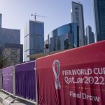 
              A view of the fence around the Doha Exhibition and Convention Center where soccer World Cup draw will be held, in Doha, Qatar, Thursday, March 31, 2022. The final draw will be held on April 1. (AP Photo/Darko Bandic)
            