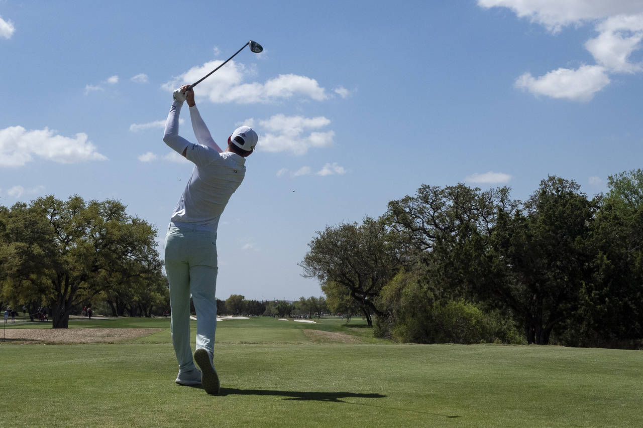 Dylan Frittelli tees off on the second hole during the third round of the Valero Texas Open golf to...
