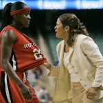 
              FILE - Rutgers coach C. Vivian Stringer gives instructions to Matee Ajavon in the second half of a regional semifinal of the NCAA women's basketball tournament in Greensboro, N.C., Saturday, March 24, 2007. Stringer has announced her retirement, Saturday, April 30, 2022, after 50 years in college basketball. She finished with 1,055 wins, fourth all-time among Division I women’s basketball coaches.(AP Photo/Mary Ann Chastain, File)
            