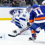 
              Tampa Bay Lightning goaltender Andrei Vasilevskiy (88) watches as New York Islanders' Zach Parise (11) shoots the puck past him for a goal during the second period of an NHL hockey game Friday, April 29, 2022, in Elmont, N.Y. (AP Photo/Frank Franklin II)
            