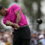 
              Tiger Woods tees off on the first hole during the first round at the Masters golf tournament on Thursday, April 7, 2022, in Augusta, Ga. (AP Photo/Matt Slocum)
            