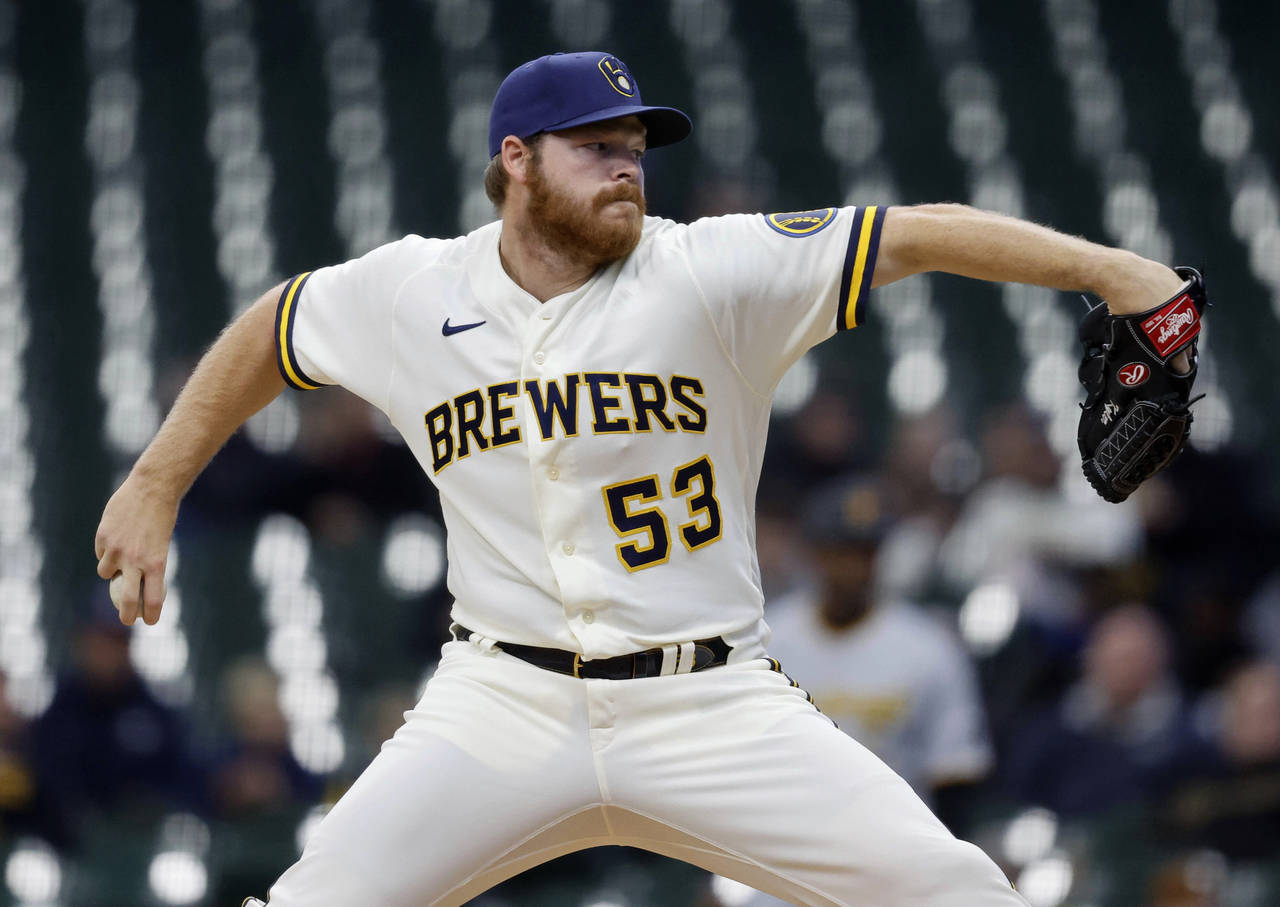 Milwaukee Brewers starting pitcher Brandon Woodruff (53) throws to the Pittsburgh Pirates during th...