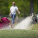 
              Xander Schauffele hits out of a bunker on the 16th green during the third round of the PGA Zurich Classic golf tournament, Saturday, April 23, 2022, at TPC Louisiana in Avondale, La. (AP Photo/Gerald Herbert)
            