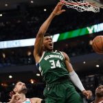 
              Milwaukee Bucks' Giannis Antetokounmpo dunks during the first half of Game 5 of their NBA playoff basketball game Wednesday, April 27, 2022, in Milwaukee. (AP Photo/Morry Gash)
            