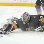
              Vegas Golden Knights goaltender Robin Lehner (90) makes a save against the New Jersey Devils during the first period of an NHL hockey game Monday, April 18, 2022, in Las Vegas. (AP Photo/Joe Buglewicz)
            
