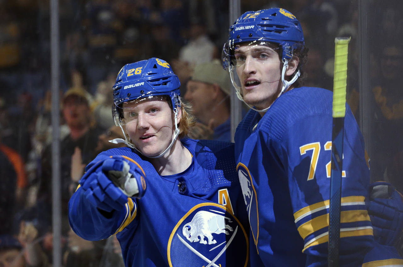 Buffalo Sabres right wing Alex Tuch (89) skates with the puck