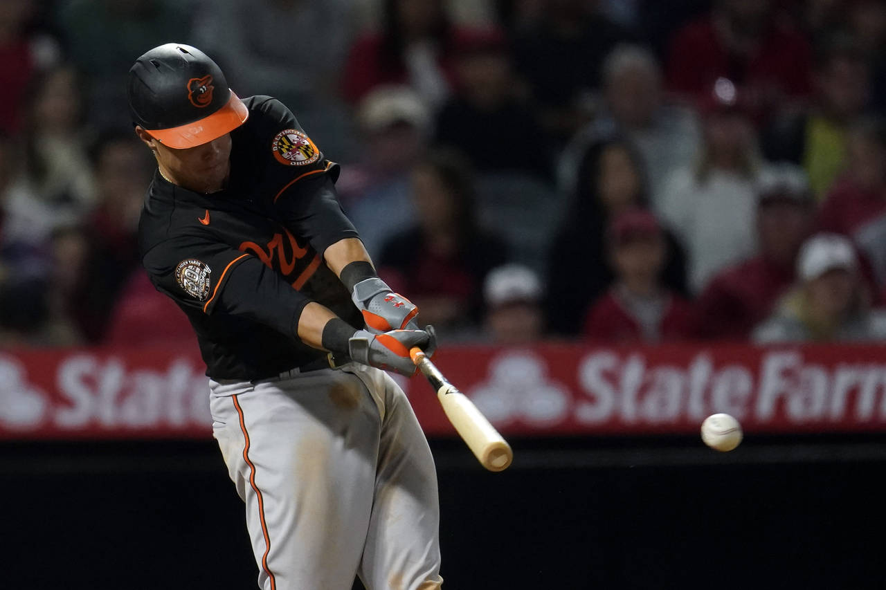 Baltimore Orioles' Ryan Mountcastle hits a two-run single during the seventh inning of the team's b...
