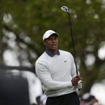 
              Tiger Woods watches his tee shot on the fourth tee during the third round at the Masters golf tournament on Saturday, April 9, 2022, in Augusta, Ga. (AP Photo/Robert F. Bukaty)
            