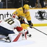 
              Nashville Predators center Mikael Granlund (64) attempts a shot against Florida Panthers goaltender Spencer Knight (30) during the second period of an NHL hockey game Saturday, April 9, 2022, in Nashville, Tenn. (AP Photo/Mark Zaleski)
            