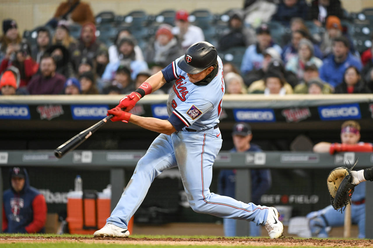 Minnesota Twins' Max Kepler hits a two-run home run off Detroit Tigers pitcher Eduardo Rodriguez du...