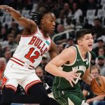 
              Milwaukee Bucks' Grayson Allen drives past Chicago Bulls' Ayo Dosunmu during the first half of Game 5 of an NBA basketball first-round playoff series Wednesday, April 27, 2022, in Milwaukee. (AP Photo/Morry Gash)
            