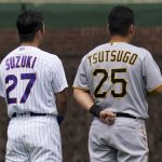 
              Chicago Cubs' Seiya Suzuki, left, of Japan, and Pittsburgh Pirates' Yoshi Tsutsugo, of Japan, stand during the national anthem before a baseball game in Chicago, Saturday, April 23, 2022. (AP Photo/Nam Y. Huh)
            