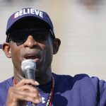 
              Jackson State football coach Deion Sanders speaks to the fans prior to the Jackson State's Blue and White Spring football game, an NCAA college football contest, Sunday, April 24, 2022, in Jackson, Miss. (AP Photo/Rogelio V. Solis)
            