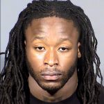 
              FILE - This Clark County, Nev., Detention Center booking photo shows New Orleans Saints running back Alvin Kamara following his arrest on Feb. 6, 2022, in Las Vegas. A judge has postponed a hearing in a felony assault case against Kamara, Kansas City Chiefs cornerback Chris Lammons and two other defendants until Aug. 1, 2022.  (Clark County Detention via AP, File)
            