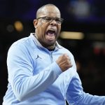 
              North Carolina head coach Hubert Davis reacts to a play during the first half of a college basketball game against Duke in the semifinal round of the Men's Final Four NCAA tournament, Saturday, April 2, 2022, in New Orleans. (AP Photo/Brynn Anderson)
            