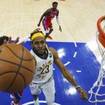 
              Indiana Pacers' Isaiah Jackson, center, puts up the shot during the second half of an NBA basketball game against the Philadelphia 76ers, Saturday, April 9, 2022, in Philadelphia. The 76ers won 133-120. (AP Photo/Chris Szagola)
            