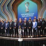 
              Coaches pose for a group photo following the 2022 soccer World Cup draw at the Doha Exhibition and Convention Center in Doha, Qatar, Friday, April 1, 2022. (AP Photo/Hussein Sayed)
            