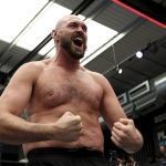 
              British boxer Tyson Fury attends an open workout for the media and fans at Wembley's Boxpark in London, Tuesday, April 19, 2022. Fury will defend his WBC heavyweight title against Dillian Whyte at Wembley Stadium Saturday. (AP Photo/Ian Walton)
            