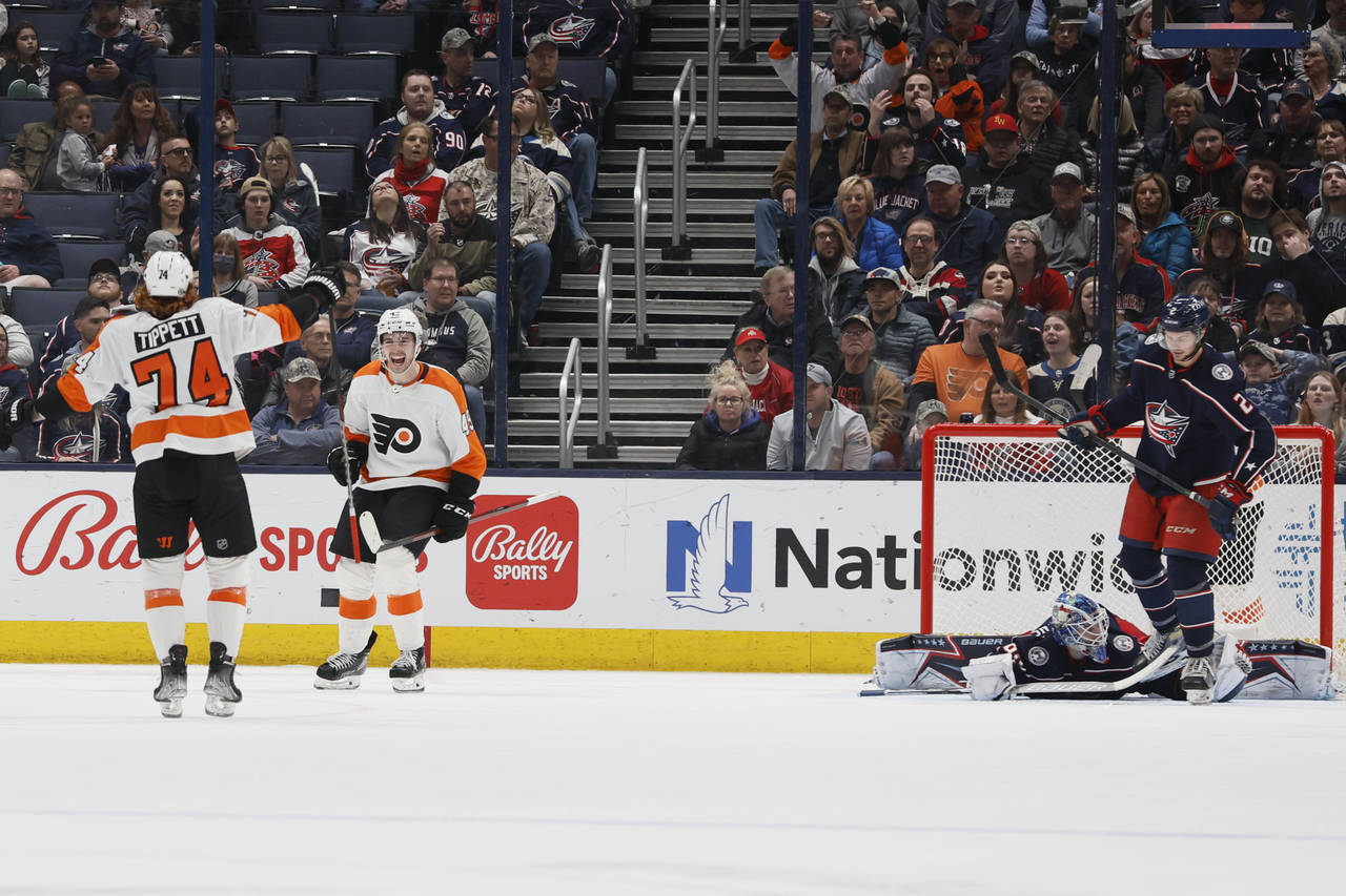 Philadelphia Flyers' Noah Cates, right, celebrates his goal against the Columbus Blue Jackets with ...