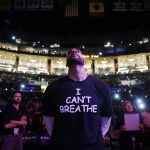 
              FILE - Los Angeles Lakers' Carlos Boozer, wearing a T-shirt reading "I Can't Breathe" stands before team introductions for an NBA basketball game against the Sacramento Kings in Los Angeles on Dec. 9, 2014. (AP Photo/Jae C. Hong, File)
            