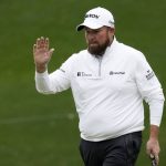 
              Shane Lowry, of Ireland, waves after a birdie putt on the sixth hole during the third round at the Masters golf tournament on Saturday, April 9, 2022, in Augusta, Ga. (AP Photo/Charlie Riedel)
            