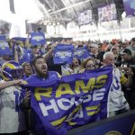 
              Los Angeles Rams fans cheer before the second round of the NFL football draft Friday, April 29, 2022, in Las Vegas. (AP Photo/Jae C. Hong)
            