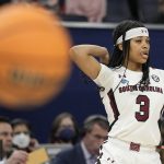 
              South Carolina's Destanni Henderson reacts after making a shot during the second half of a college basketball game in the semifinal round of the Women's Final Four NCAA tournament Friday, April 1, 2022, in Minneapolis. (AP Photo/Eric Gay)
            