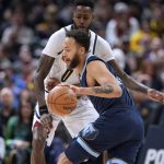 
              Memphis Grizzlies forward Kyle Anderson, front, drives on Denver Nuggets forward JaMychal Green during the first half of an NBA basketball game Thursday, April 7, 2022, in Denver. (AP Photo/David Zalubowski)
            