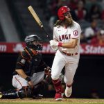 
              Los Angeles Angels' Brandon Marsh watches his two-run home run during the sixth inning of the team's baseball game against the Baltimore Orioles on Saturday, April 23, 2022, in Anaheim, Calif. (AP Photo/Marcio Jose Sanchez)
            