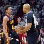 
              Atlanta Hawks guard Trae Young (11) talks with official Marc Davis after being called for a foul during the first half of Game 1 of an NBA basketball first-round playoff series against the Miami Heat, Sunday, April 17, 2022, in Miami. (AP Photo/Lynne Sladky)
            