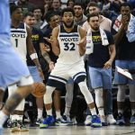 
              Minnesota Timberwolves center Karl-Anthony Towns reacts after an official called him for out of bounds against the Memphis Grizzlies during the second half in Game 4 of an NBA basketball first-round playoff series Saturday, April 23, 2022, in Minneapolis. The Timberwolves won 119-118. (AP Photo/Craig Lassig)
            
