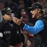 
              Miami Marlins manager Don Mattingly, right, argues with home plate umpire Nick Mahrley after being ejected during the fourth inning of a baseball game against the Los Angeles Angels Monday, April 11, 2022, in Anaheim, Calif. (AP Photo/Mark J. Terrill)
            