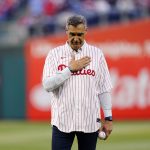
              Villanova's Jay Wright pauses before throwing out a ceremonial pitch before a baseball game between the Philadelphia Phillies and the Milwaukee Brewers, Sunday, April 24, 2022, in Philadelphia. (AP Photo/Matt Slocum)
            