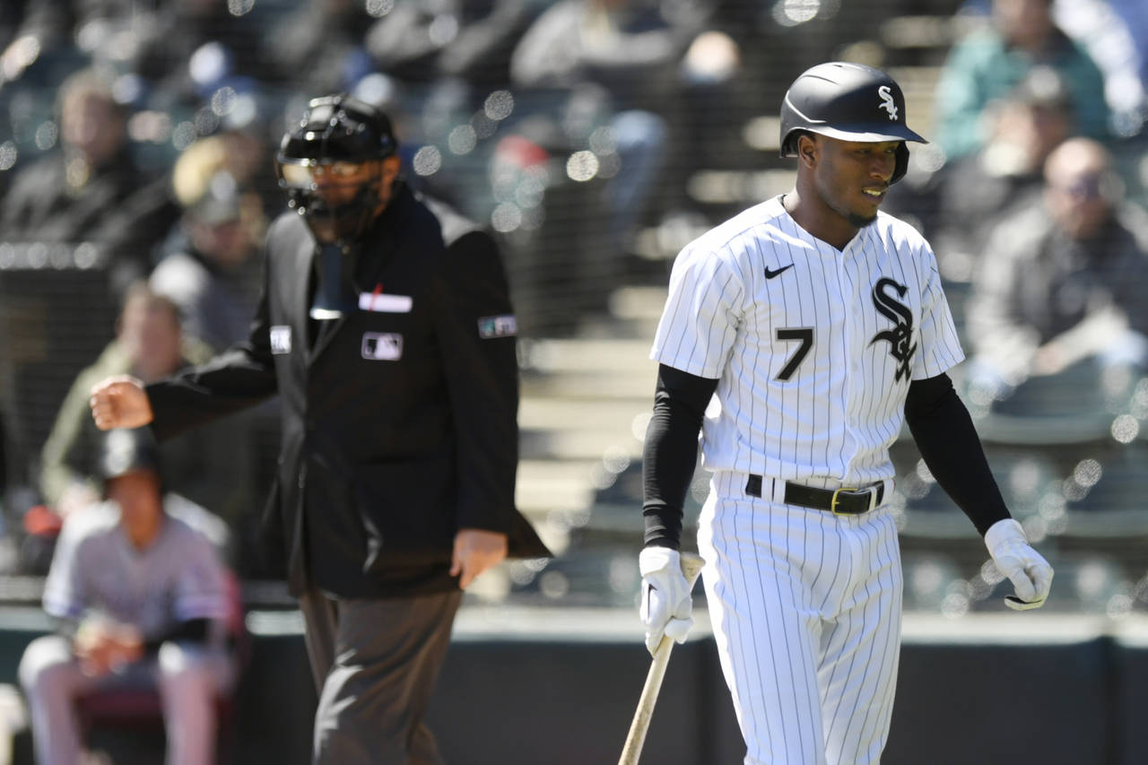Chicago White Sox's Tim Anderson walks away after striking out during the first inning of the team'...
