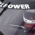 
              Will Power of Australia sits in his car during IndyCar auto racing testing at Indianapolis Motor Speedway, Wednesday, April 20, 2022, in Indianapolis. (AP Photo/Darron Cummings)
            