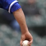 
              Kansas City Royals starting pitcher Zack Greinke grips a baseball during the team's against the Chicago White Sox Wednesday, April 27, 2022, in Chicago. (AP Photo/Charles Rex Arbogast)
            