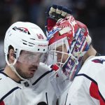 
              Washington Capitals left wing Marcus Johansson (90) and goaltender Ilya Samsonov (30) celebrate a win over the Colorado Avalanche in an NHL hockey game Monday, April 18, 2022, in Denver. (AP Photo/Jack Dempsey)
            