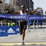 
              Evans Chebet, of Kenya, hits the finish line to win the 126th Boston Marathon, Monday, April 18, 2022, in Boston. (AP Photo/Winslow Townson)
            