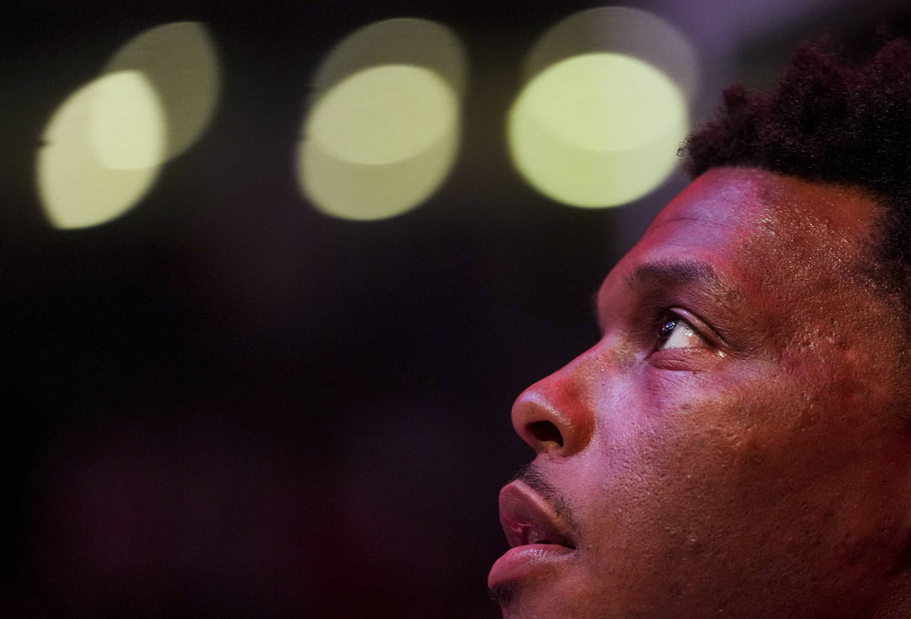 Miami Heat guard Kyle Lowry sings the Canadian national anthem before the team's NBA basketball gam...