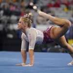 
              Oklahoma's Ragan Smith competes on the floor exercise during the NCAA women's gymnastics championships, Thursday, April 14, 2022, in Fort Worth, Texas. (AP Photo/Tony Gutierrez)
            