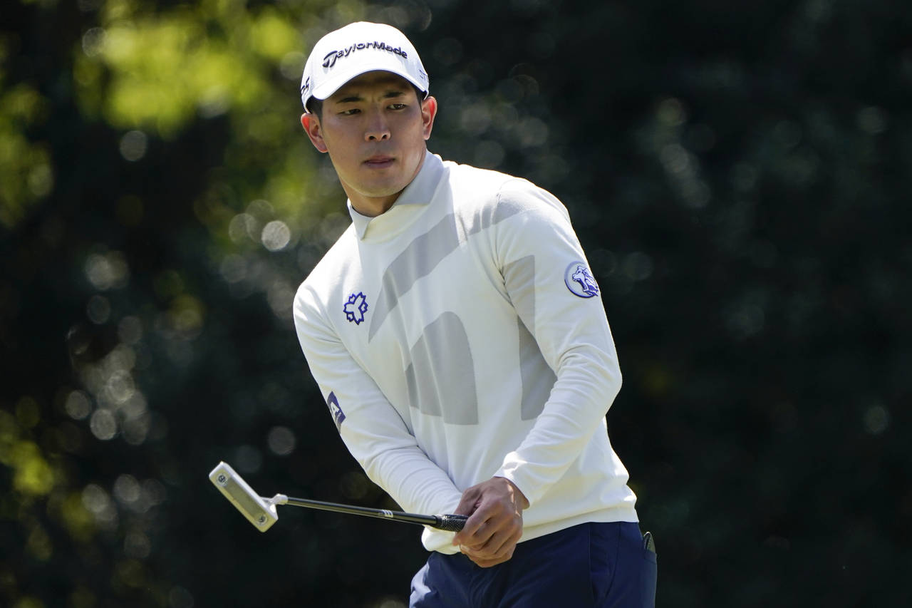 Amateur Keita Nakajima, of Japan, watches his putt on the 15th green during a practice round for th...
