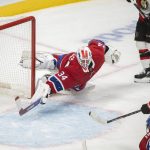
              Montreal Canadiens goaltender Jake Allen is scored on by Ottawa Senators' Brady Tkachuk during the second period of an NHL hockey game in Montreal, Tuesday, April 5, 2022. (Graham Hughes/The Canadian Press via AP)
            