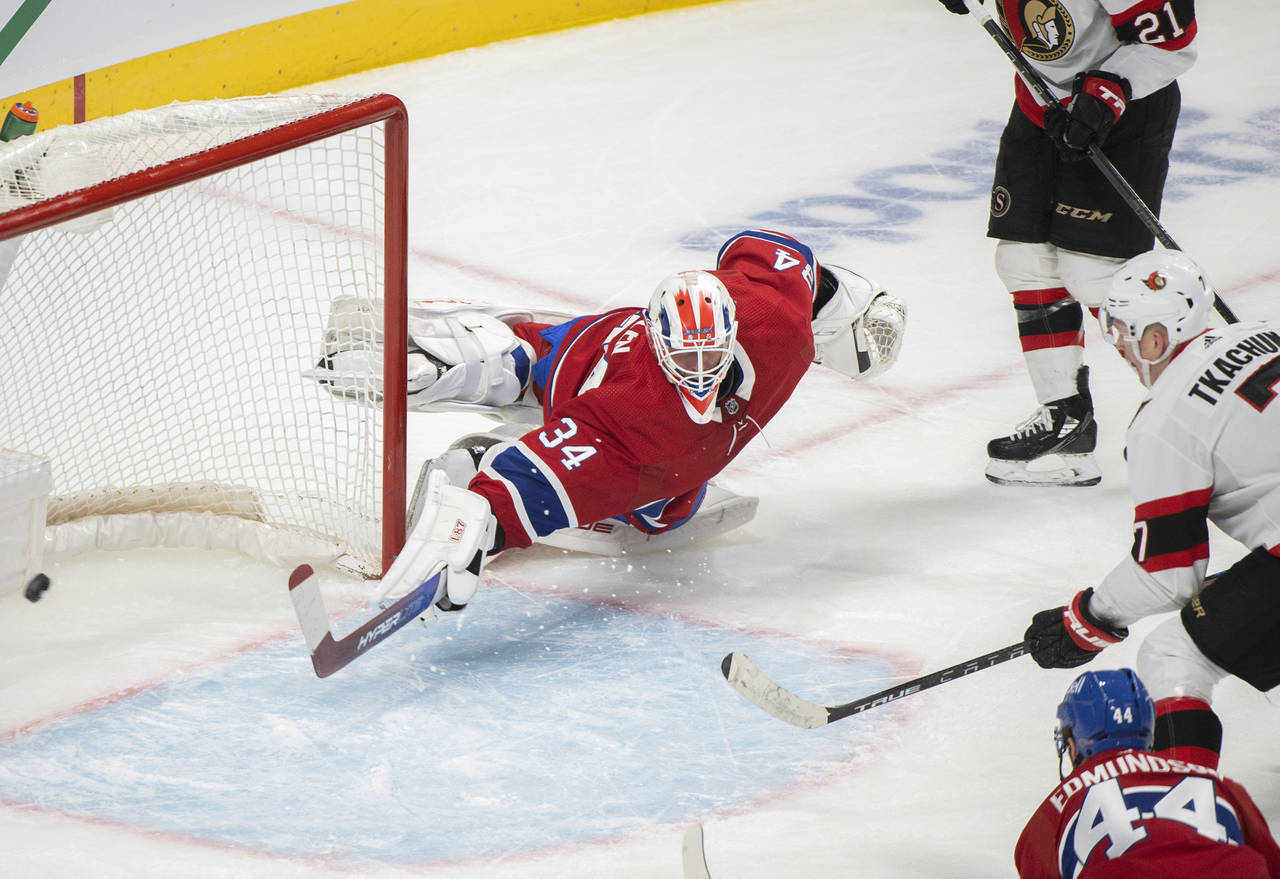 Montreal Canadiens goaltender Jake Allen is scored on by Ottawa Senators' Brady Tkachuk during the ...