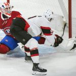 
              Montreal Canadiens goaltender Jake Allen stops Ottawa Senators' Josh Norris during the first period of an NHL hockey game in Montreal, Tuesday, April 5, 2022. (Graham Hughes/The Canadian Press via AP)
            
