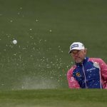 
              Lee Westwood, of England, hits out of a bunker on the second hole during the third round at the Masters golf tournament on Saturday, April 9, 2022, in Augusta, Ga. (AP Photo/Matt Slocum)
            