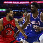 
              Toronto Raptors' Fred VanVleet, left, looks to make his move against Philadelphia 76ers' Joel Embiid, right, during the first half of Game 1 of an NBA basketball first-round playoff series, Saturday, April 16, 2022, in Philadelphia. (AP Photo/Chris Szagola)
            