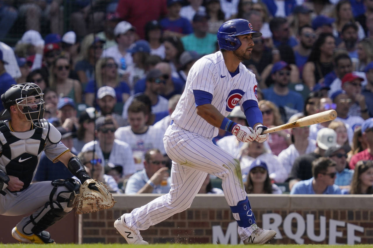 Chicago Cubs' Alfonso Rivas watches after hitting a one-run single during the fifth inning of a bas...