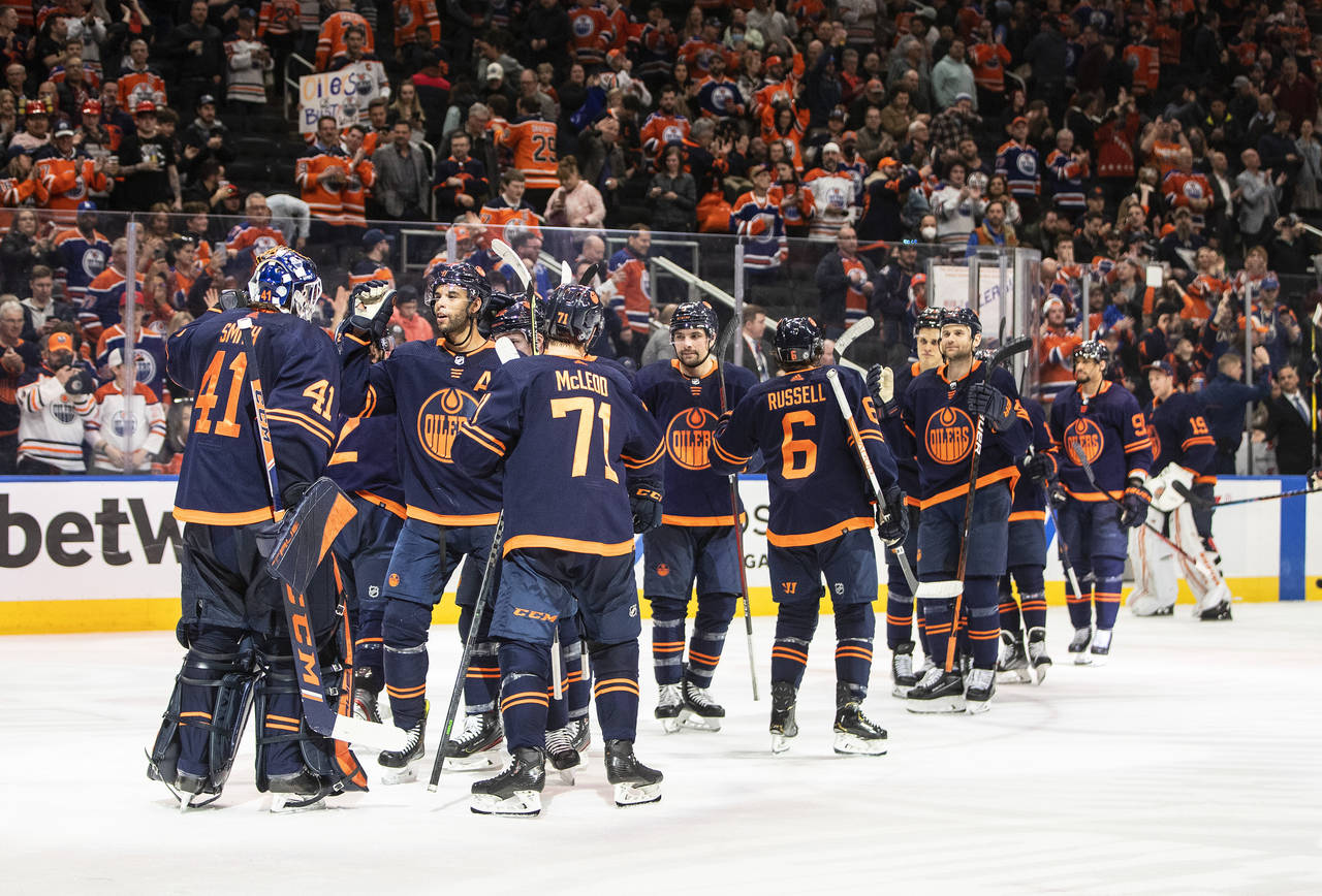 Edmonton Oilers celebrate a win over the Dallas Stars in an NHL hockey game Wednesday, April 20, 20...